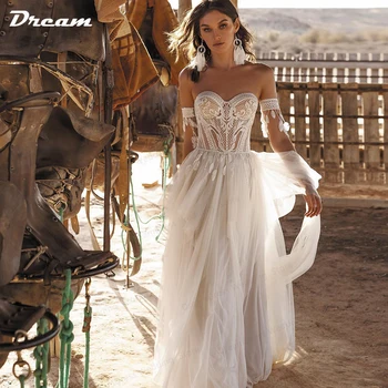 Очарователно булчинската рокля на мечтите си, в стил бохо, скъпа лейси апликация трапецовидна форма, богемное сватбена рокля с открити рамене, сватбена рокля